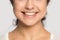 Close up of happy ethnic girl show white healthy smile