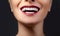 Close-up Happy Smile with Healthy White Teeth, Bright Red Lips Make-up. Cosmetology, Dentistry and Beauty care