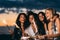 Close up of happy women holding sparklers