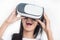 Close-up of happy Women using VR-headset glasses of virtual reality on isolated white background,
