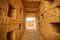 close-up of hay bales stacked to create maze walls