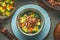 Close up of healthy balanced nutrition meal in bowl with beef meat, rice , steamed vegetables: broccoli and carrots served with pl