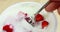 Close-up of healthy strawberry and white yogurt man use the spoon for eat, concept of healthy food
