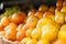 Close up of heap of oranges and lemons