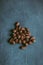 A close-up of a heap of peeled almond and hazel nuts