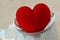 Close-up of heart in trash basket - Concept of love and suffering