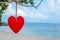 Close up of Heart on the tree on tropical beach with seascape background, love relax concept