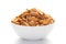 Close up of Heeng jeera Peanuts mixture Indian namkeen snacks on a ceramic white bowl.