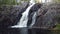 Close-up of Hepokongas waterfall in Kainuu, Finland. The flowing water from the huge rock shows the power of water and the beauty