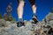 Close up of hikers legs, walking in rocky mountains