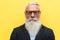 Close up of hipster senior bearded serious man - Mature fashion and elderly lifestyle concept - Focus on nose, mouth, glasses