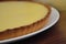 Close Up Homemade Lemon Cheesecake Pie on Dark wooden Background. Food Preparing. step by Step Dessert Cooking Process.