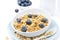 Close-up of homemade muesli, blueberries and milk