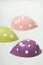 Close up of homemade pink dotted chocolate bonbons. Assortment of hand painted candies. Mockup with copy space. Macro shot of
