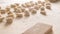 Close up of homemade vegan gnocchi pasta with wholemeal flour on the wooden chopping board with back light morning sunlight bokeh