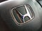 close up Honda logo on the steering wheel