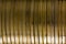 Close up on a horizontal stack of gold coins