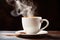 close-up of hot coffee steaming in a white mug