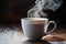 close-up of hot coffee steaming in a white mug