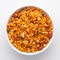 Close-Up of Hot spicy Nav Ratan snacks in a white Ceramic bowl, made with red chili, peanuts. Indian spicy snacks Namkeen,