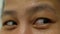 Close up human eyes looking side to side. Asian women eyes starring