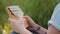 Close up human hands of female unknown musician woman girl hipster playing on exotic traditional african musical wooden