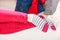 Close up of human woman feet in striped socks.