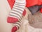 Close up of human woman feet in striped socks.