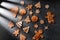 close up of iced gingerbread on black table top