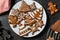 close up of iced gingerbread cookies on plate