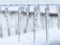 Close-Up Of Icicles On Railing