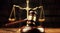 Close-up of the iconic gavel and scales of justice resting on a judge\\\'s desk, symbolizing court trial, fairness, and legal