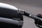 Close up of the ignition key hole on handle of motorbike