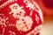 Close-up of illuminated christmas balls - woolen needlework