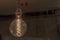 Close Up Of An Illuminated Vintage Hanging Light Bulb
