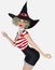 Close up image of a beautiful young blond female witch smiling and dancing on an isolated white background