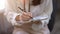 Close-up image, businesswoman signing her signature on a documents