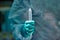 Close up image of doctor`s hand holding syringe against patient. Local anesthesia was used before surgery in the