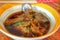 Close-up image of duck noodles, add chicken leg, puree, Thai food, put in a hot cup, delicious