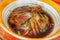 Close-up image of duck noodles, add chicken leg, puree, Thai food, put in a hot cup, delicious