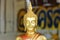 Close-up image, face, Buddha image in a beautiful golden buddhist religion