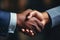 Close-up image of a firm handshake standing for a trusted partnership