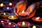 Close-up image of hands lighting Diwali diyas, symbolizing the victory of light over darkness