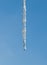 Close-Up Image of Icicle on the Blue Sky Background