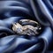 Close-up image of intertwined wedding rings with diamonds and sapphires