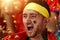 Close-up image of man, portugal football fan emotionally watching match, cheering up team during game