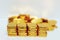 Close-up image of many gold bars Focusing on some points Gold business Puppet Saving gold Gold White background