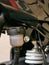 Close up image of motorcycle brake fluid tank reservoir.