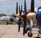 Close up image of a parked airplane's front propeller, showing the blades and their intricate detail