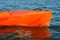 Close up Image of Red Kayak on Beautiful River or Lake at the Evening